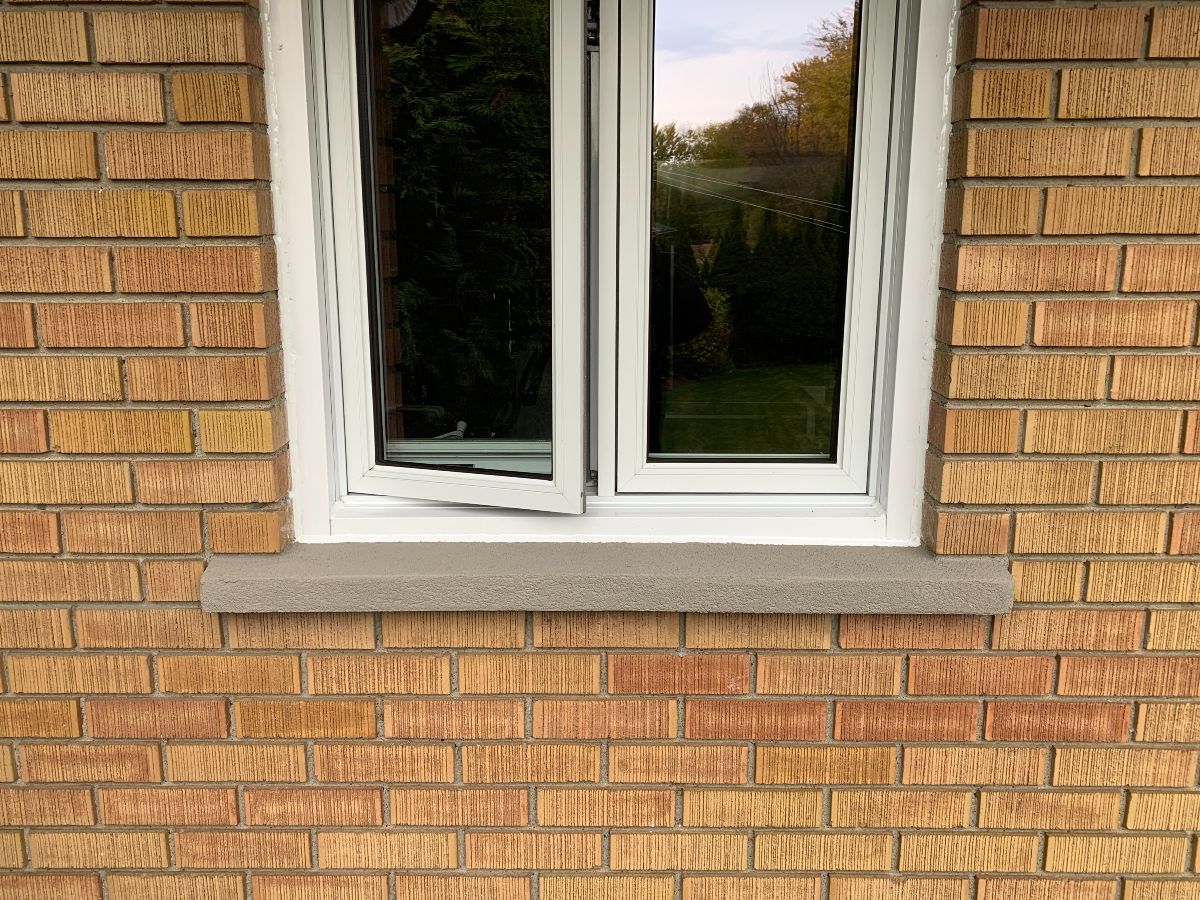 Réparation de béton d'allège de fenêtre